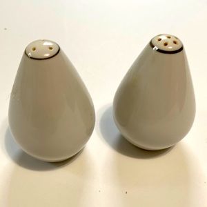 Vintage Made in Japan Salt & Pepper Shakers with silver trim